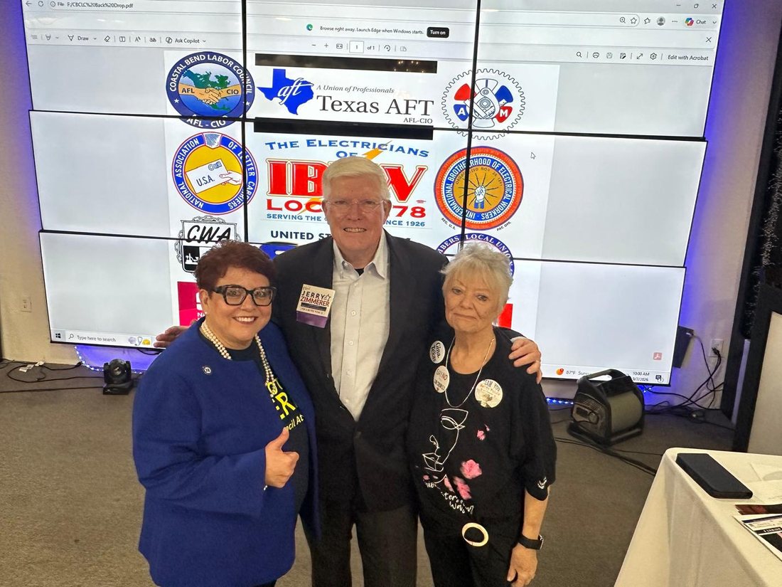 Jerry Zimmerer with two labor leaders in front of a screen of union emblems
