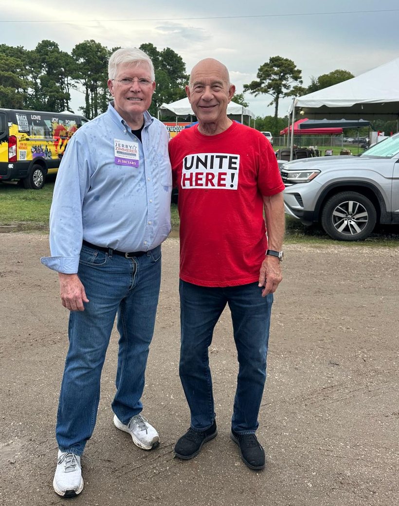 Jerry Zimmerer with a UNITE HERE member at an outdoor campaign event